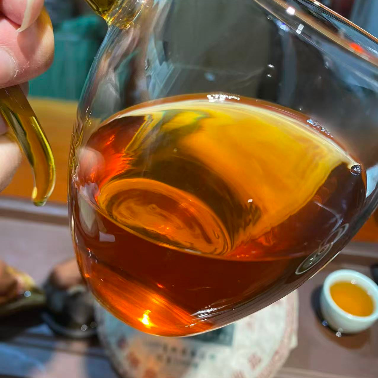 brewed aged sheng pu-erh tea with clear amber color