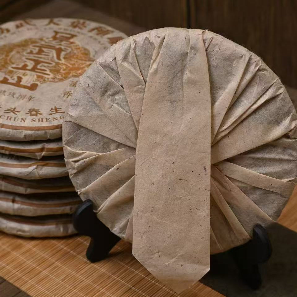 traditional bamboo basket packed pu-erh tea cake